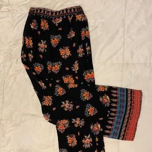 Women’s black base with floral pattern pants